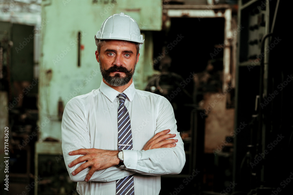 Senior Project manager working in industrial factory Senior Project manager working in industrial factory