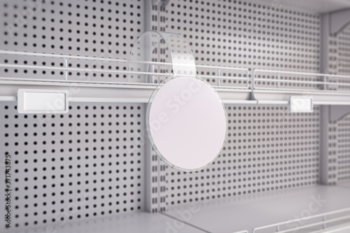 Empty white supermarket shelves with label tag. Promotion and price of product photo