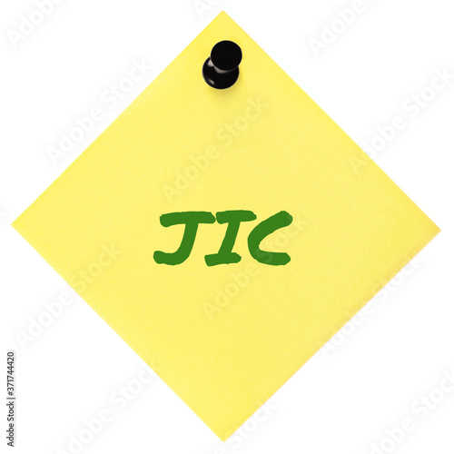 Just in case initialism JIC green marker written acronym text, isolated yellow post-it to-do list sticky note reminder abbreviation sticker, black pushpin thumbtack macro closeup, memo information photo