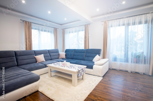 Interior of a rich house cozy living room.