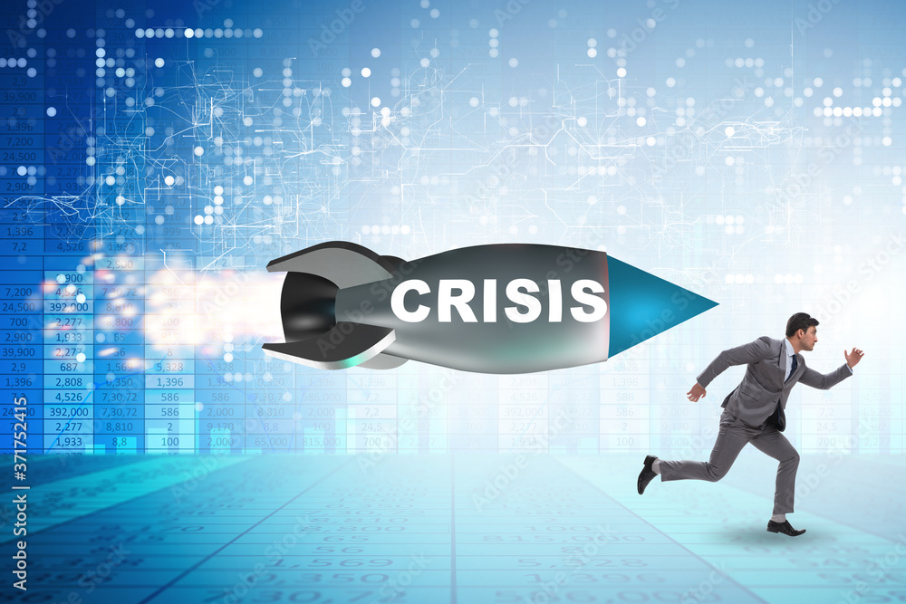 Concept of crisis with businessman chased by rocket Concept of crisis with businessman chased by rocket