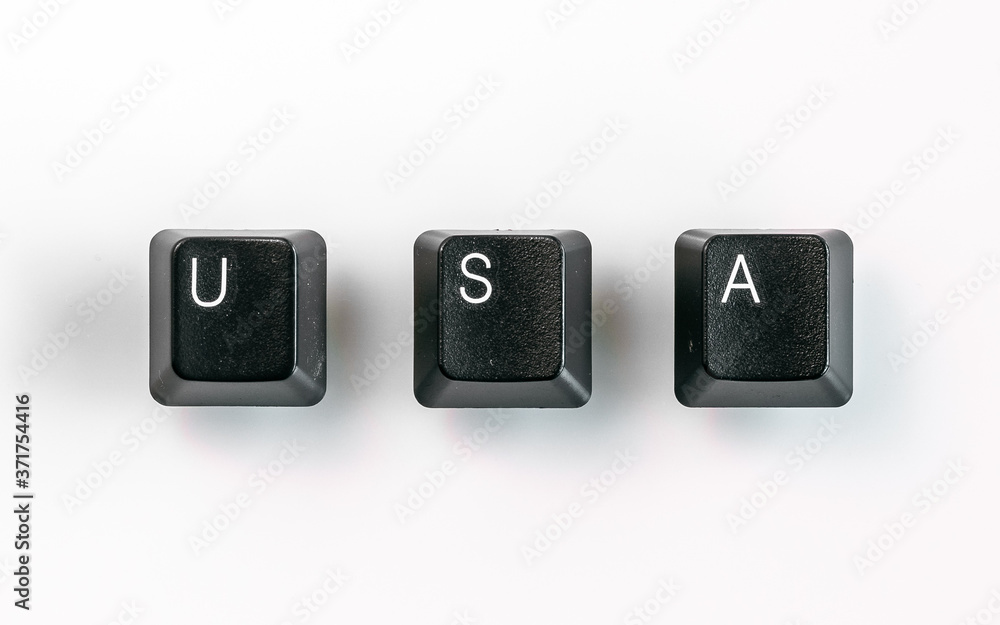 Neatly arranged computer keyboard keys spelling USA, isolated on white background Neatly arranged computer keyboard keys spelling USA, isolated on white background