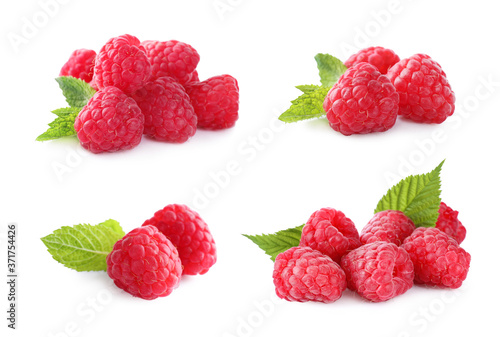 Set of fresh ripe raspberries with green leaves on white background