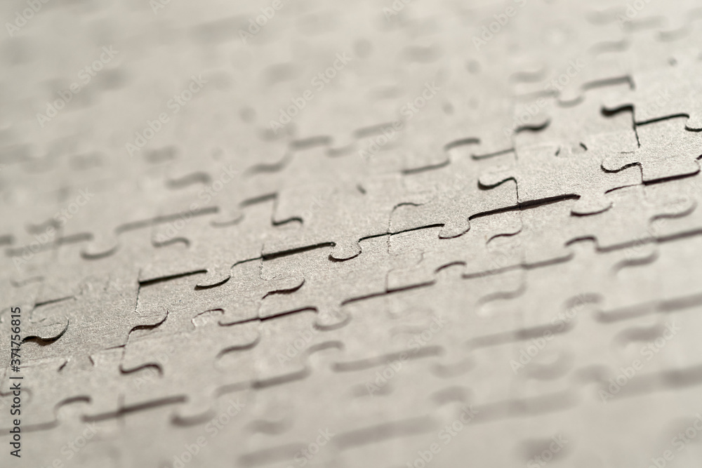 The texture of the assembled paper puzzles. The texture of the assembled paper puzzles.