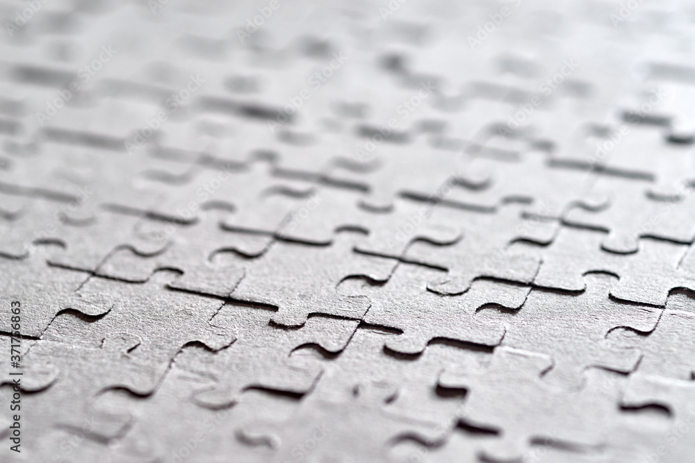 The texture of the assembled paper puzzles. The texture of the assembled paper puzzles.
