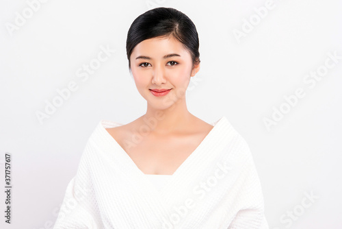 Beautiful Young asian Woman with Clean Fresh Skin, on white background, Face care, Facial treatment, Cosmetology, beauty and spa, Asian women portrait © kitthanes