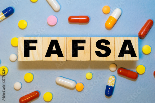 FAFSA Free application for federal student aid. Letters on the cubes.