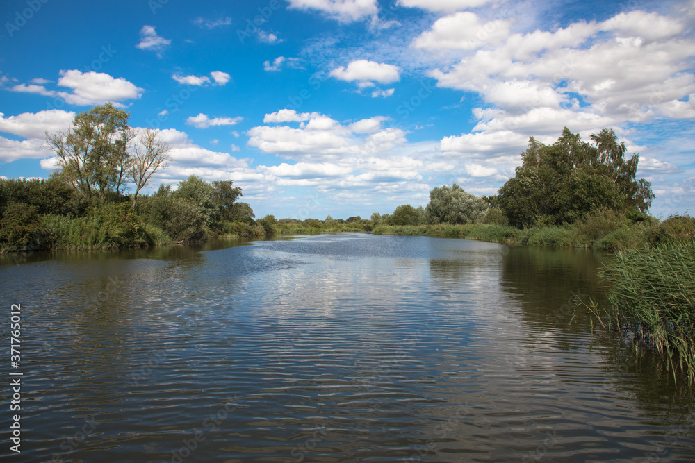 Views of the River Bure between Saint Benet's Abbey and the The Weirs / South Walsham Broad, The Broads, Norfolk, UK Views of the River Bure between Saint Benet's Abbey and the The Weirs / South Walsham Broad, The Broads, Norfolk, UK