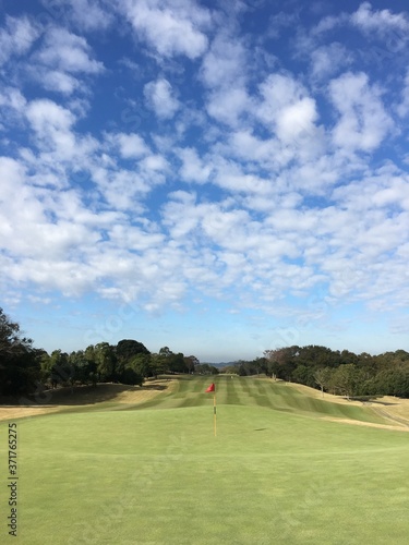 golf course with blue sky