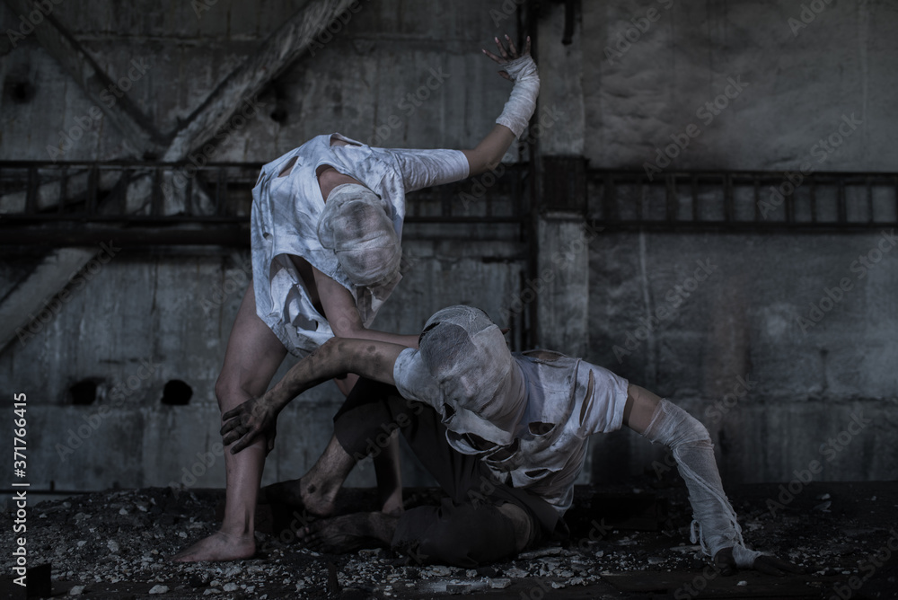 Fototapeta premium Dirty monsters boy and girl with bandaged faces