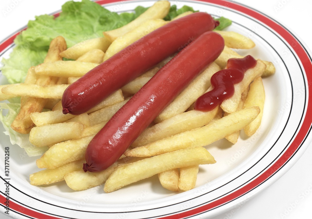 Sausages, French Fries and Tomato Sauce in a Plate Sausages, French Fries and Tomato Sauce in a Plate