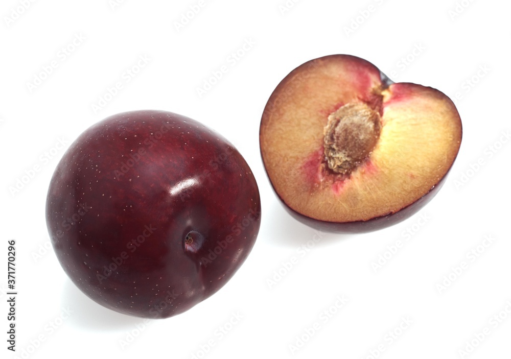 Red Plums against White Background