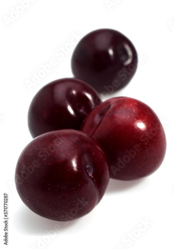 Wallpaper Mural Red Plums against White Background Torontodigital.ca