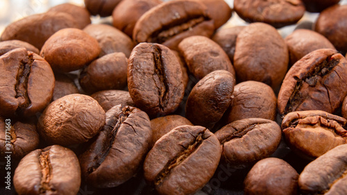 Coffee beans and ground coffee in a macro shot, close-up