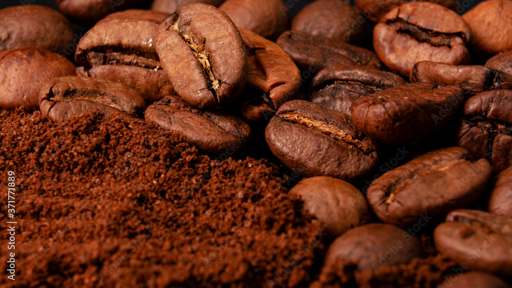 Coffee beans and ground coffee in a macro shot, close-up Coffee beans and ground coffee in a macro shot, close-up