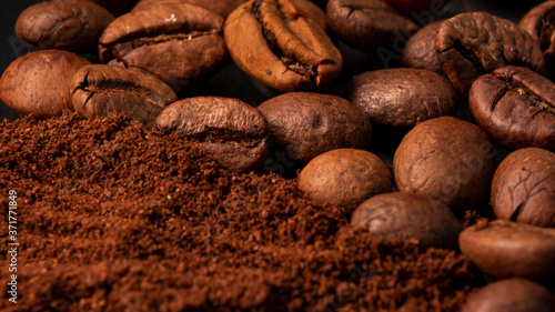Coffee beans and ground coffee in a macro shot, close-up
