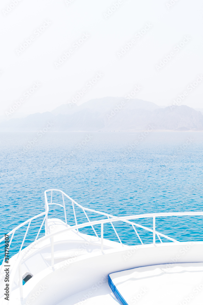 recreation on boat, rest yachting in blue quiet tropical sea, summer landscape of ship in calm open turquoise ocean