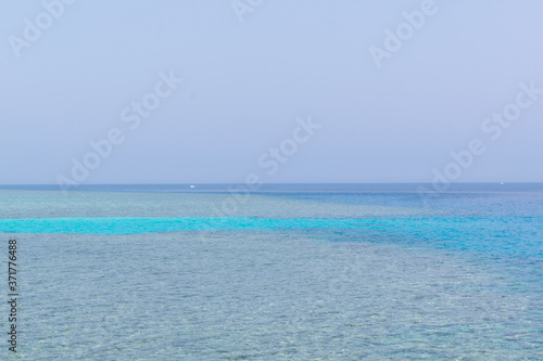 Turquoise blue sea, nature landscape of calm open ocean in tropics