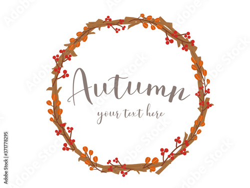 木の枝と木の実の秋のリース