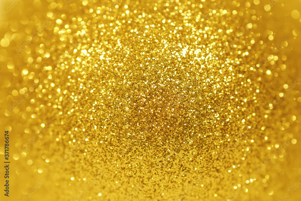 Detailed texture of golden glitter dust surface