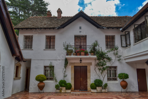 Buildings on the territory of the Trooditissa Monastery - the male monastery of the Paphos Metropolis of the Cyprus Orthodox Church, located in the Troodos Mountains photo