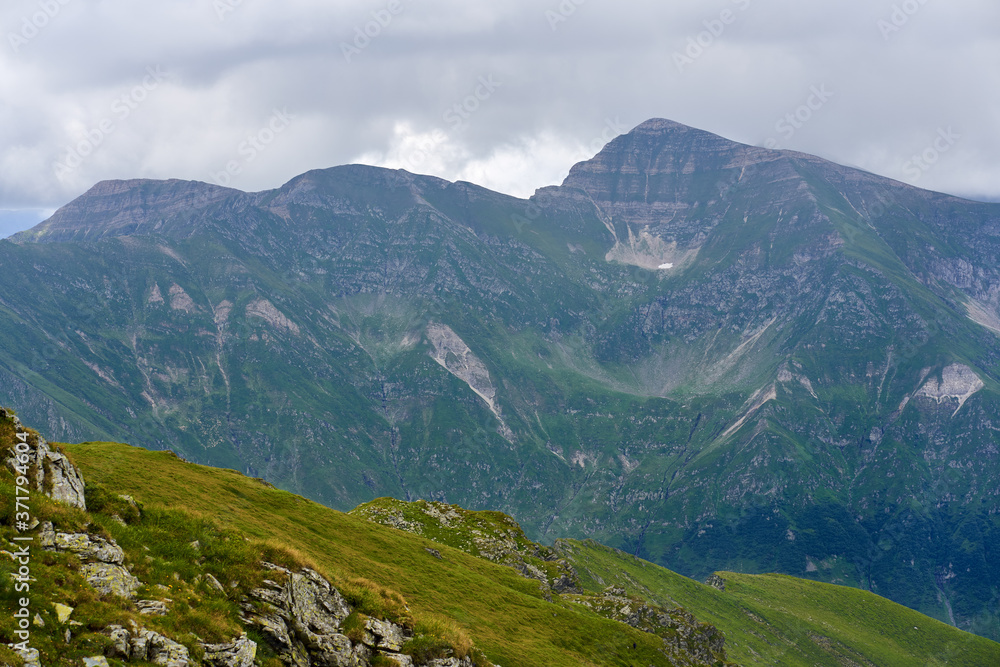 Fototapeta premium Alpine landscape, cloudy