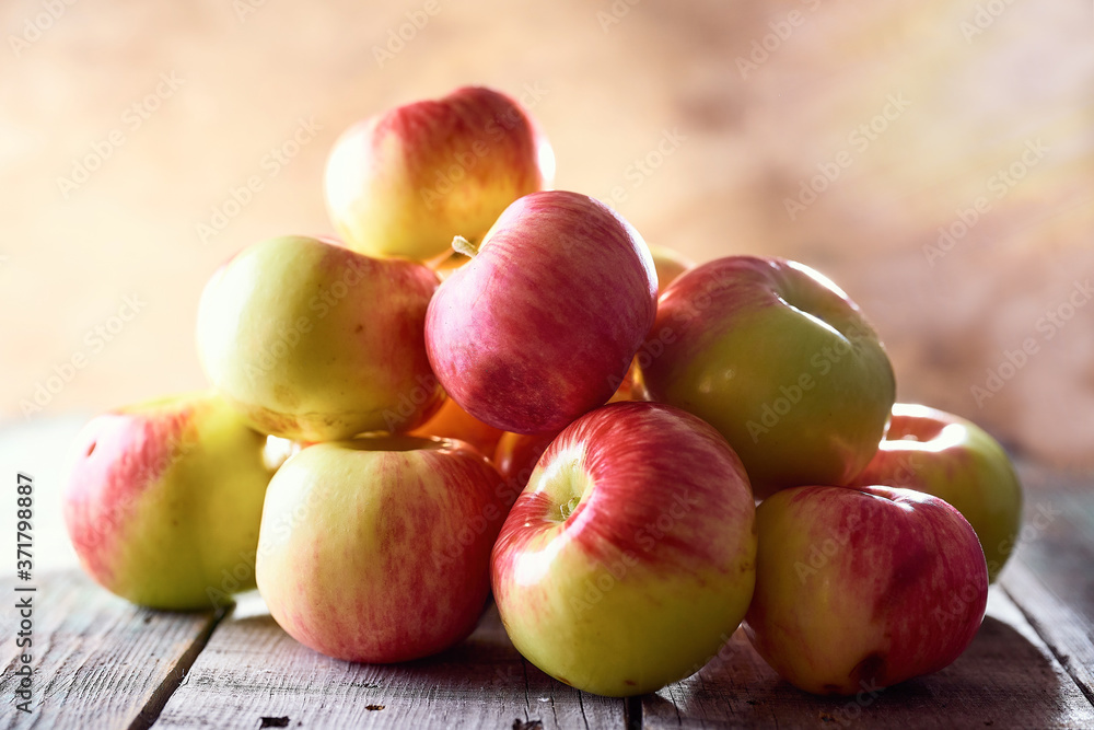 Composition of village red apples on a wooden table Composition of village red apples on a wooden table