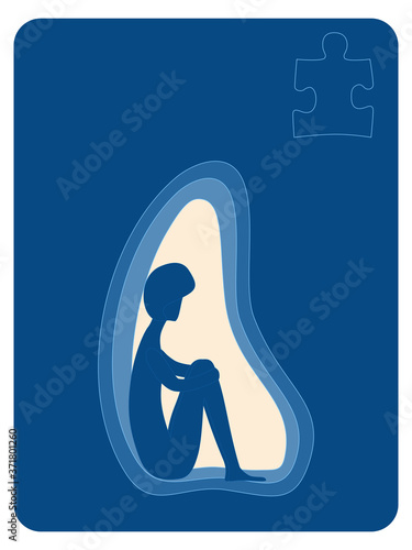 Autism awareness. Human in silhouette sitting alone hiding from the world  Puzzle shape autism symbol. Copy space for mar information. 