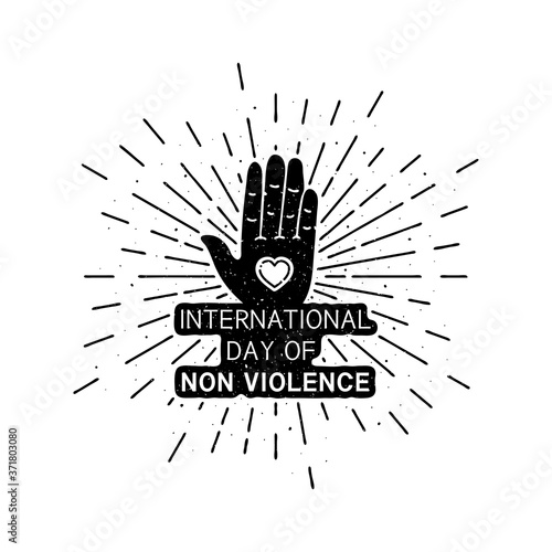 International day of non violence with lettering. Holiday grunge vintage illustration with sun rays in the background