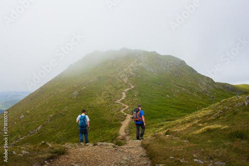 Climbers on a Scottish Munro Mountain in the mist  © gavin