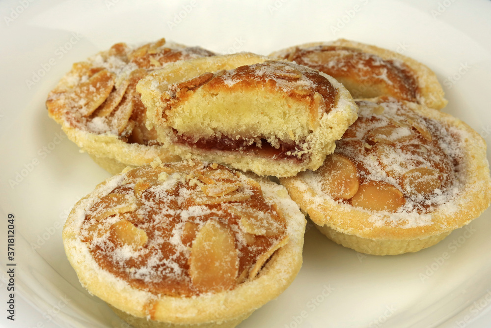 homemade almond buttery Bakewell tarts.