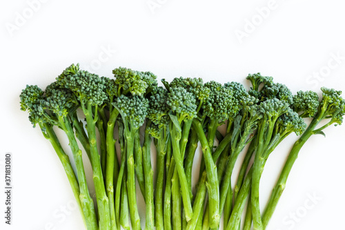 Fresh broccolini isolated on white background with copy space.
