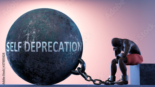 Self deprecation as a heavy weight in life - symbolized by a person in chains attached to a prisoner ball to show that Self deprecation can cause suffering, 3d illustration photo