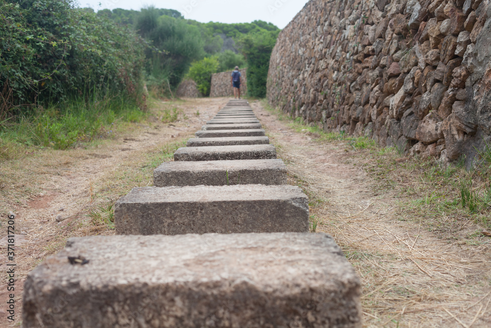 The stone wall is made without cement. Menorca The stone wall is made without cement. Menorca