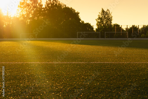 An empty soccer field in the sun