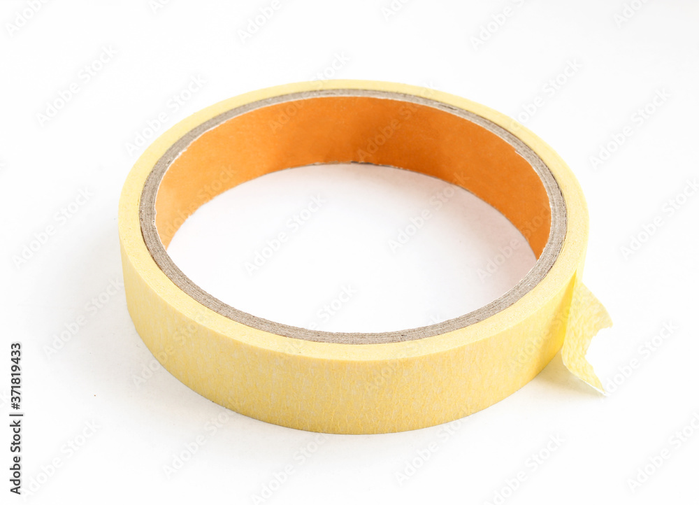 Yellow sticky tape roll isolated on white. Duct tape close-up Yellow sticky tape roll isolated on white. Duct tape close-up