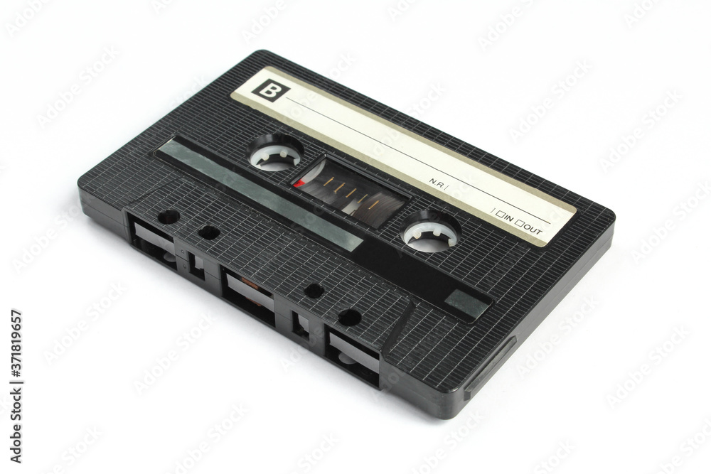 Black cassette isolated on white background. B side. Retro Black cassette isolated on white background. B side. Retro