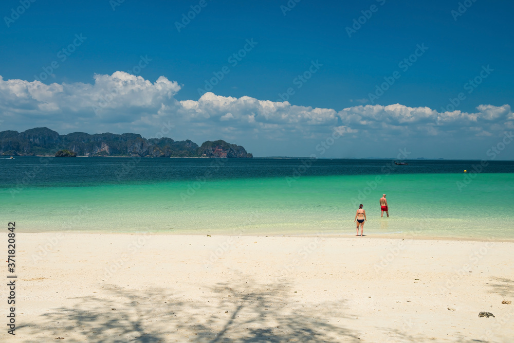 old couple enjoy turquoise sea at Poda island