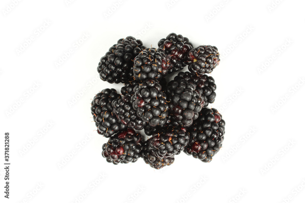 Pile of wet blackberries isolated on white background. Fresh fruit Pile of wet blackberries isolated on white background. Fresh fruit