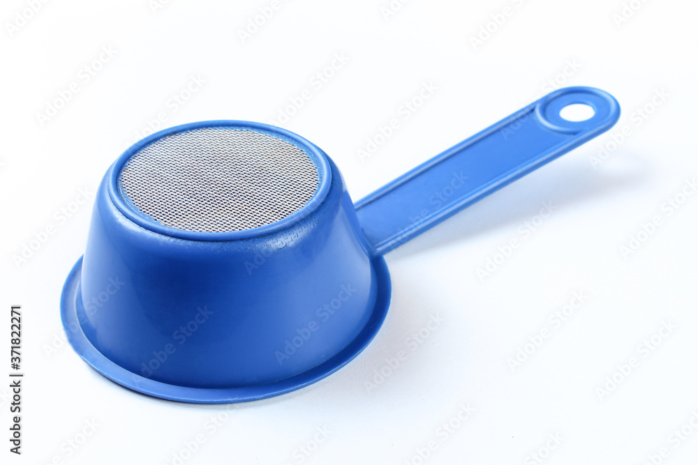 Blue sieve isolated on white background. Kitchenware with net. Strainer Blue sieve isolated on white background. Kitchenware with net. Strainer