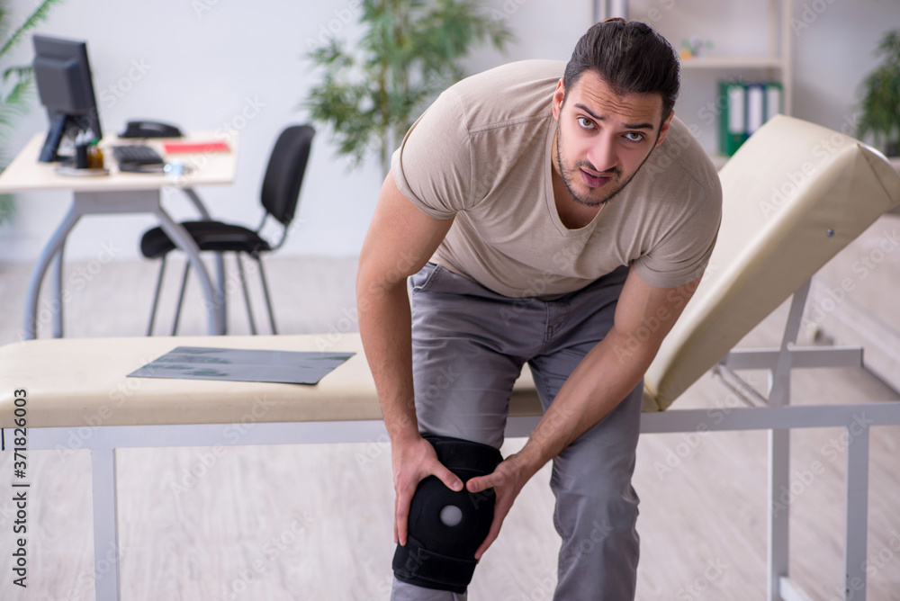 Young leg injured man in the hospital Young leg injured man in the hospital