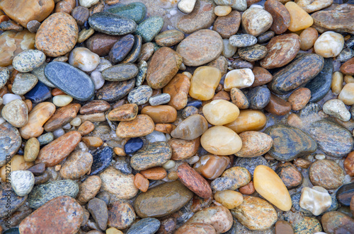 outdoor grunge stone background, pebble stone background