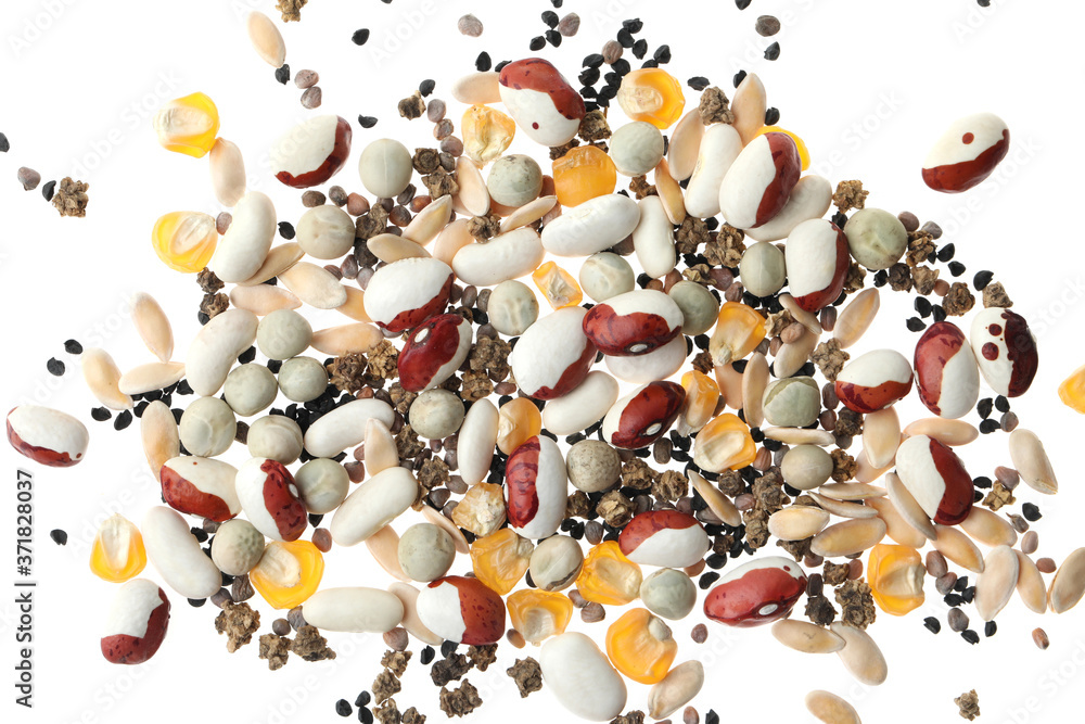Fototapeta premium Mix of vegetable seeds on white background, top view