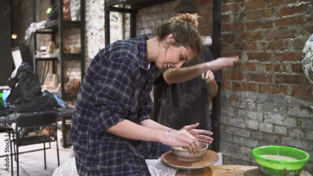 Making a handmade clay pot in the workshop. Pottery lesson with master. Making a handmade clay pot in the workshop. Pottery lesson with master.
