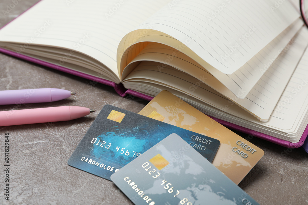 Credit cards and stationery on marble table Credit cards and stationery on marble table