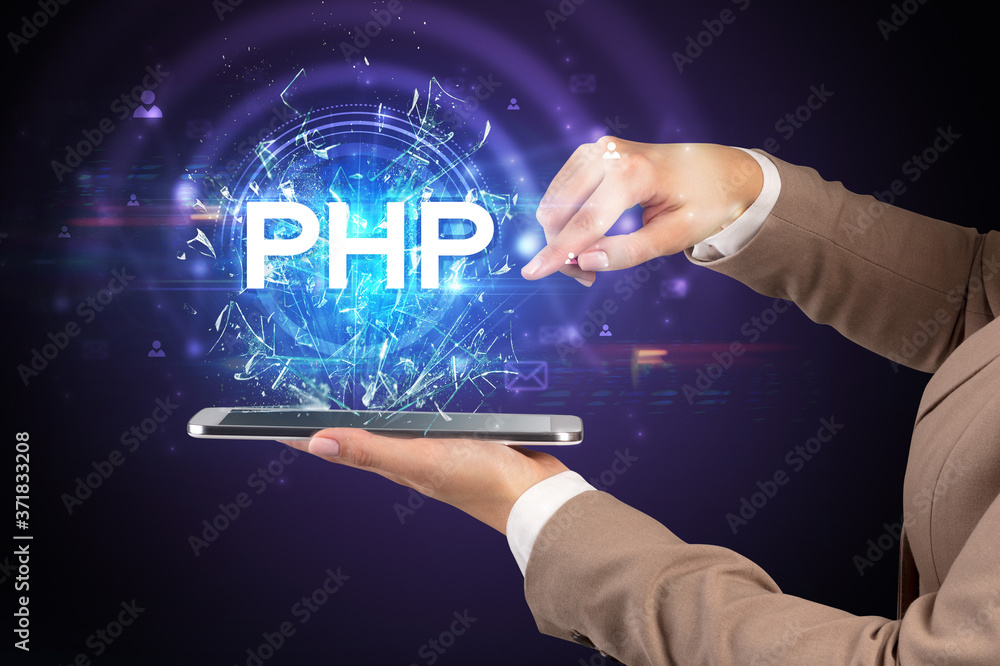 Close-up of a touchscreen with PHP abbreviation, modern technology concept Close-up of a touchscreen with PHP abbreviation, modern technology concept