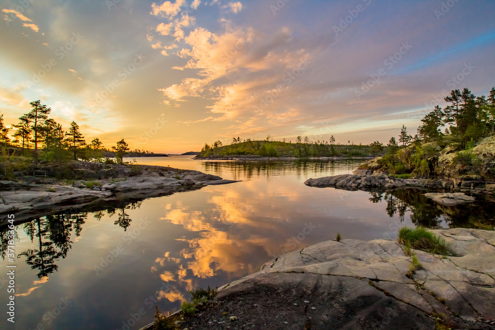 Lake in Karelia. Russia. Lake Ladoga at dawn. Nature regions of Russia. Skers of Lake Ladoga. Tourism Russia. Landscapes of Northern Nature. Rocky coast of Ladoga. Guide to Karelia. Russian north