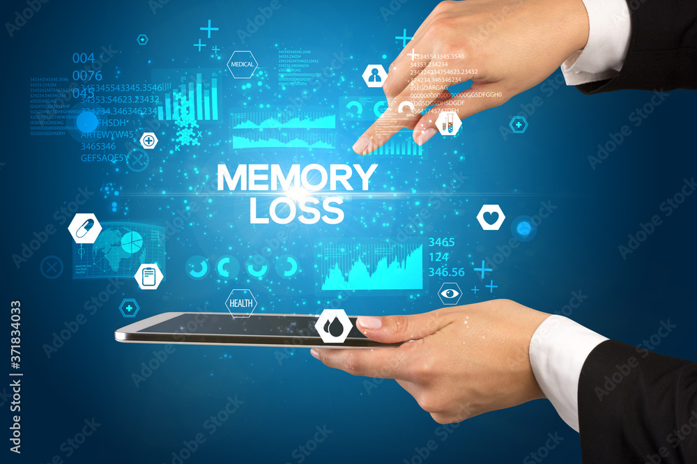 Close-up of a touchscreen with MEMORY LOSS inscription, medical concept Close-up of a touchscreen with MEMORY LOSS inscription, medical concept
