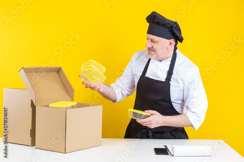 Man in a black chef hat and...