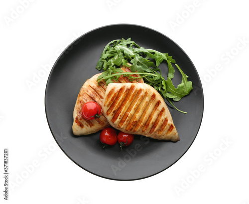 Tasty grilled chicken fillets with tomatoes and arugula isolated on white, top view